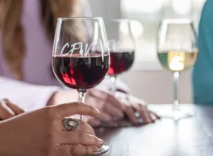 Image of wine glass with CFW logo